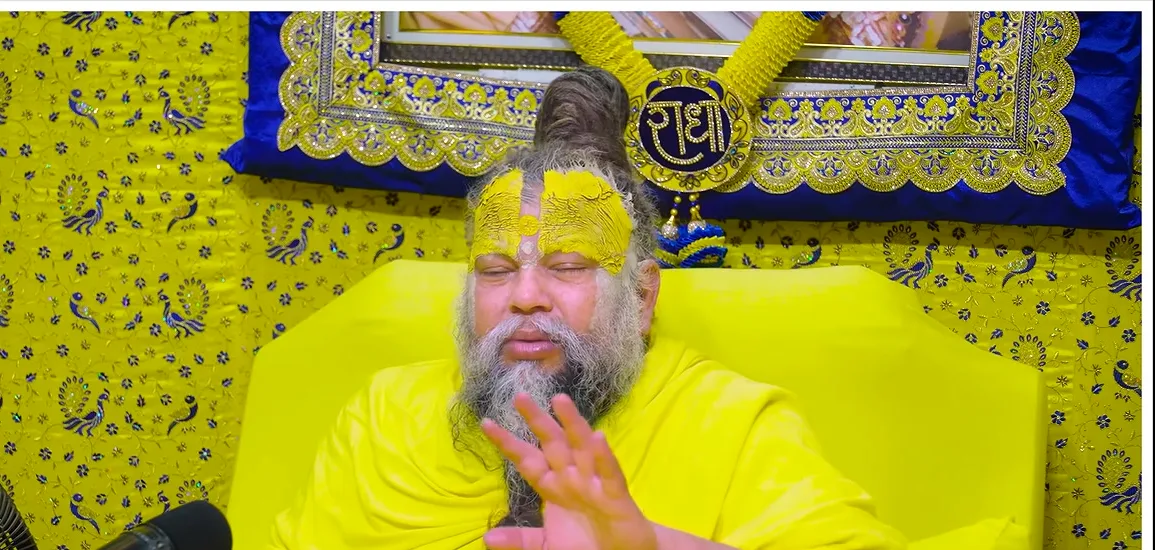 Premanand Ji Maharaj one hand raised in teaching, gold backdrop