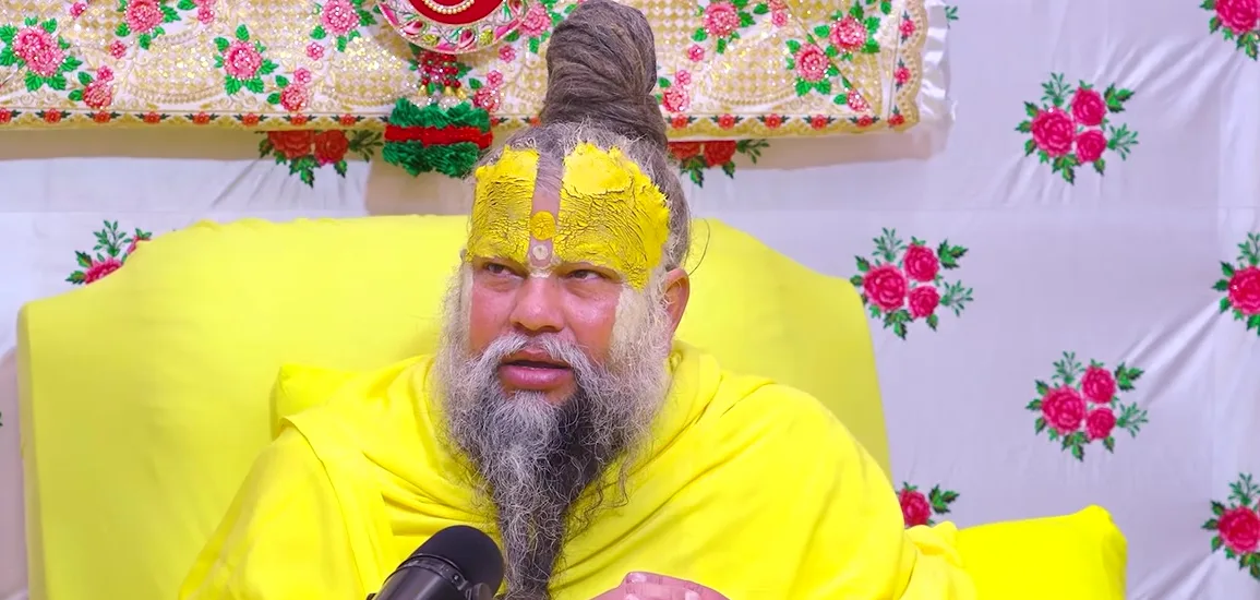 Premanand Ji Maharaj looking towards the devotees in front of him