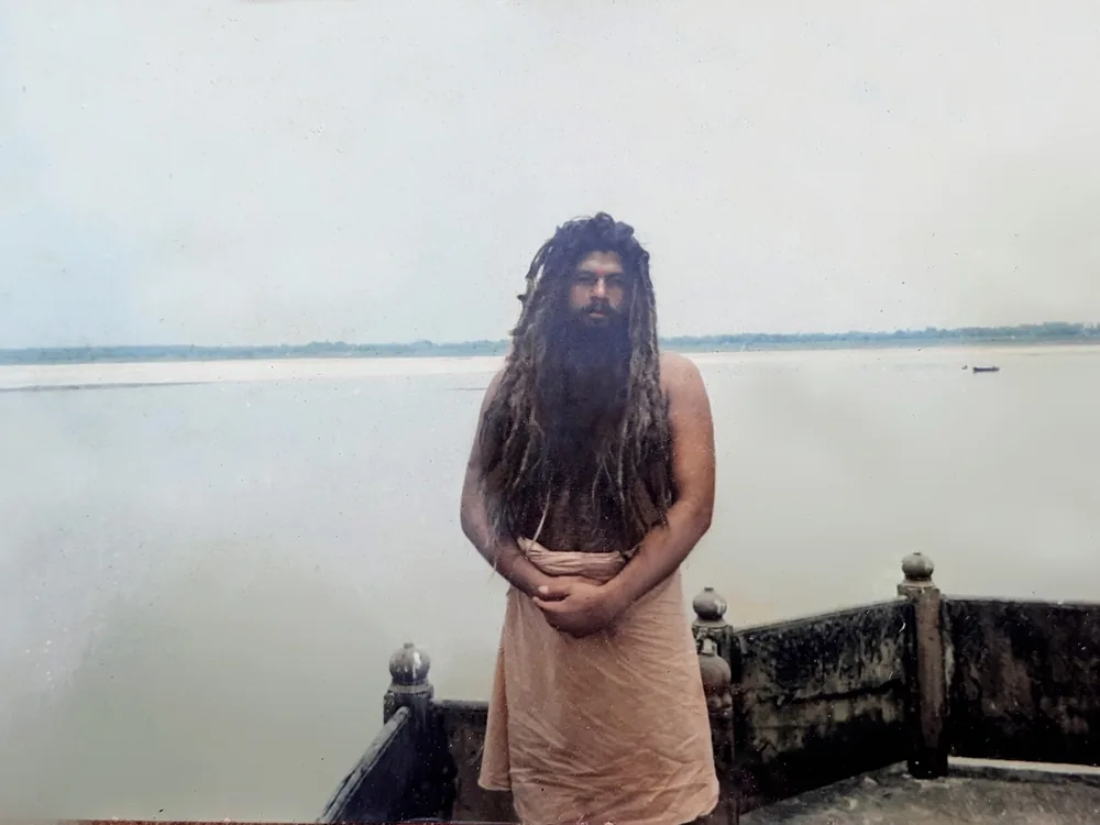 Premanand Ji Maharaj as a young ascetic on the banks of the Ganga at Varanasi, around 1996