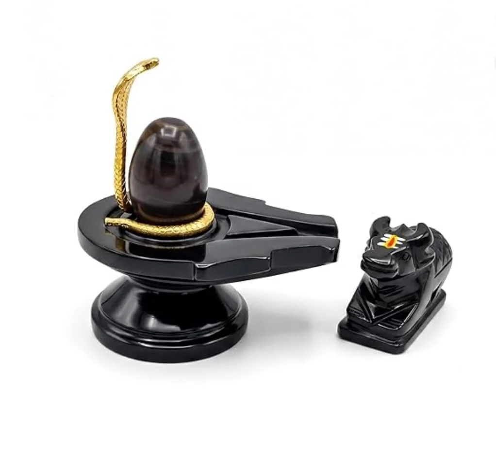 Narmadeshwar shivling with brass snake and Nandi